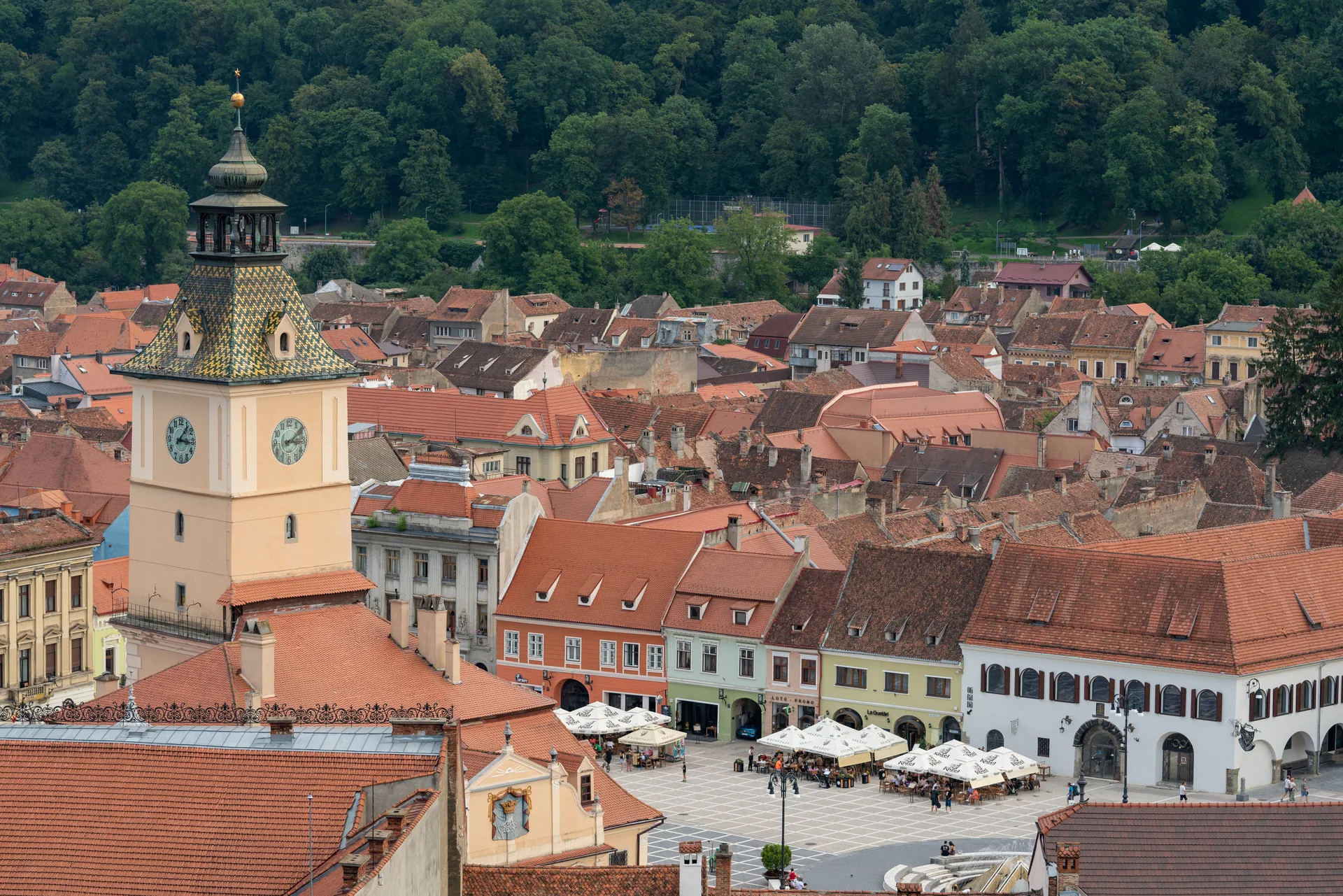 Brașov’s Council House and Council Square above the old town’s red rooftops.