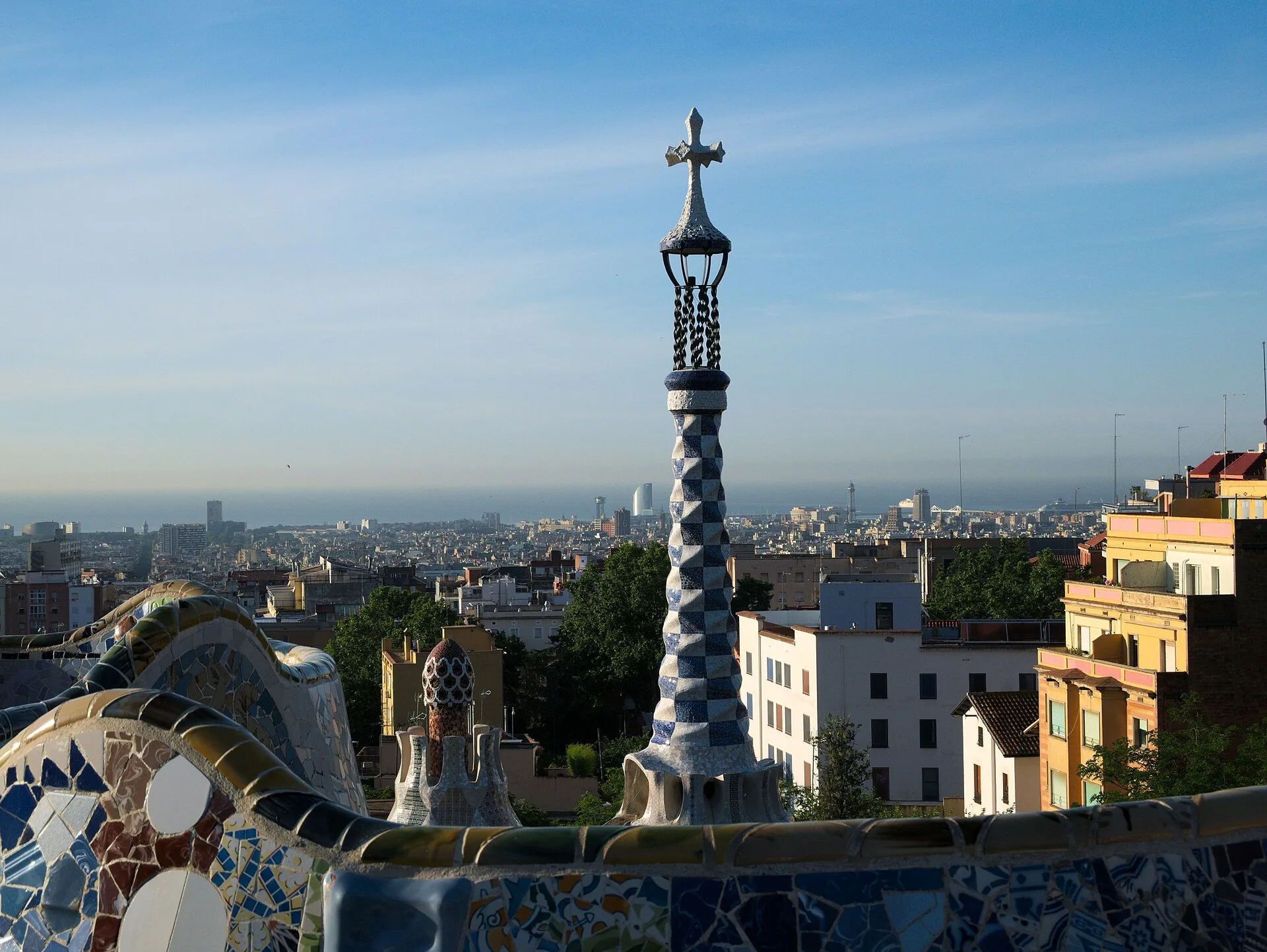 Park Güell’s mosaic terrace and distinctive entrance pavilion overlooking Barcelona