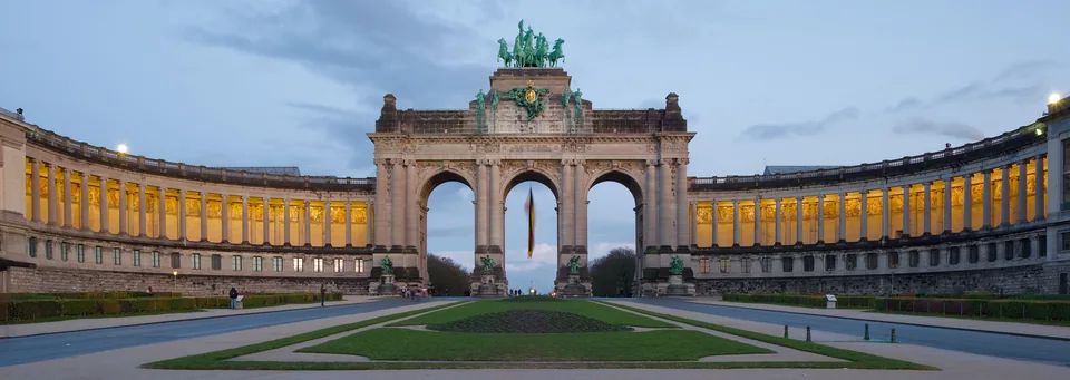 The triumphal arches of the Cinquantenaire in Brussels at twilight