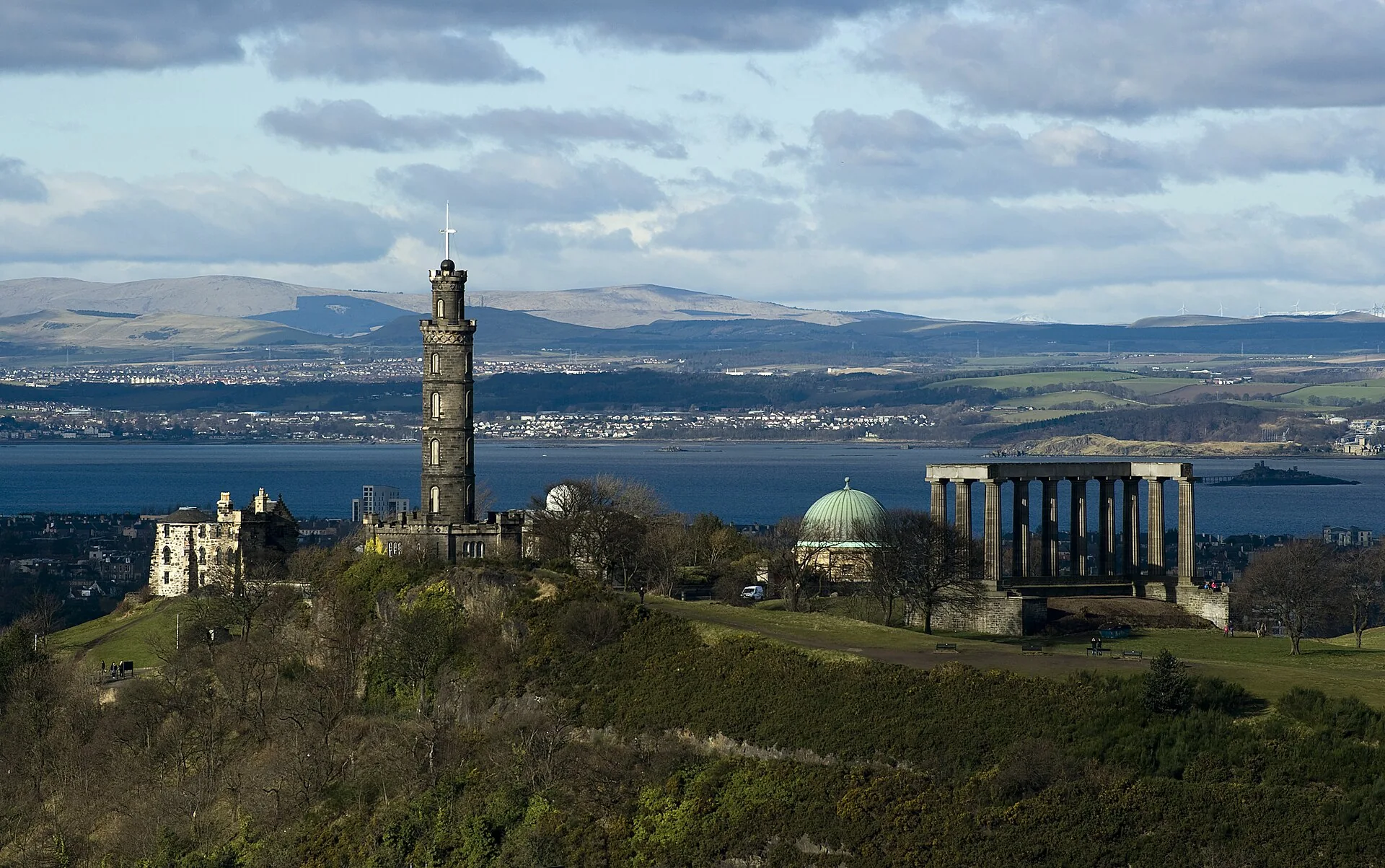 Nelson Monument and National Monument on Calton Hill, with the Firth of Forth beyond