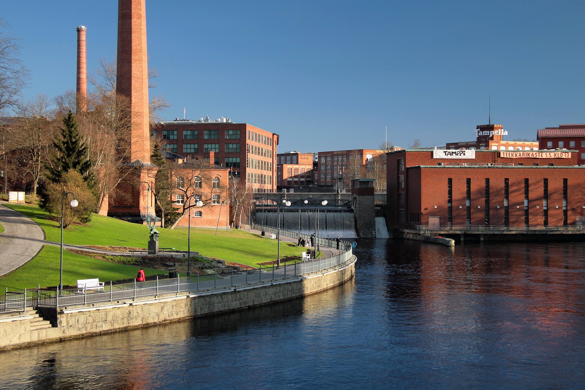 Tammerkoski rapids and red-brick Tampella factory buildings in central Tampere