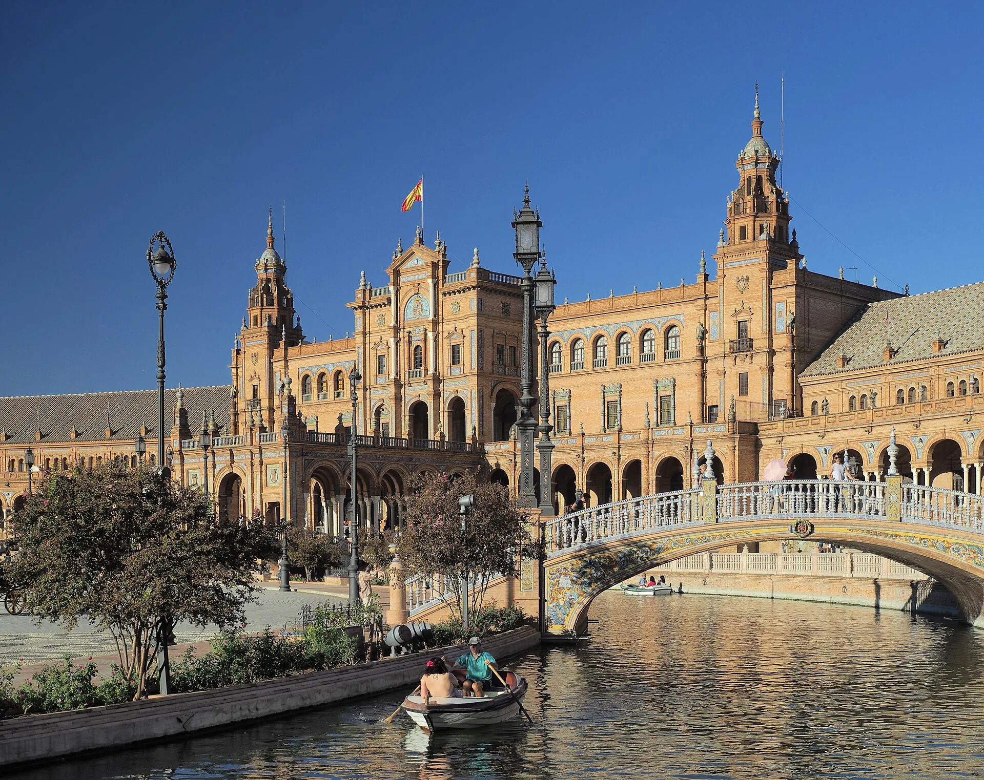 Plaza de España’s brick towers, colonnade and canal in Seville