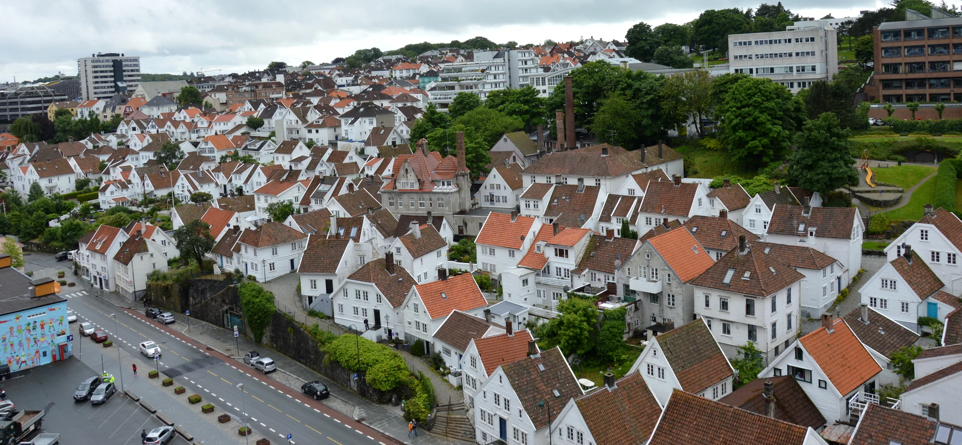The white wooden houses and red roofs of Gamle Stavanger beside Vågen