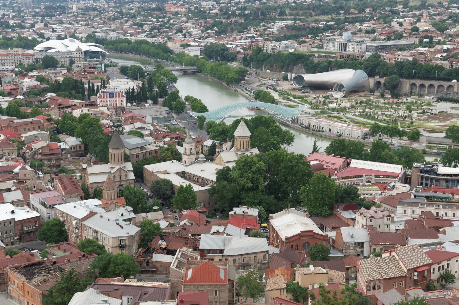 Tbilisi old town, Sioni Cathedral and the Mtkvari river with the Bridge of Peace beyond