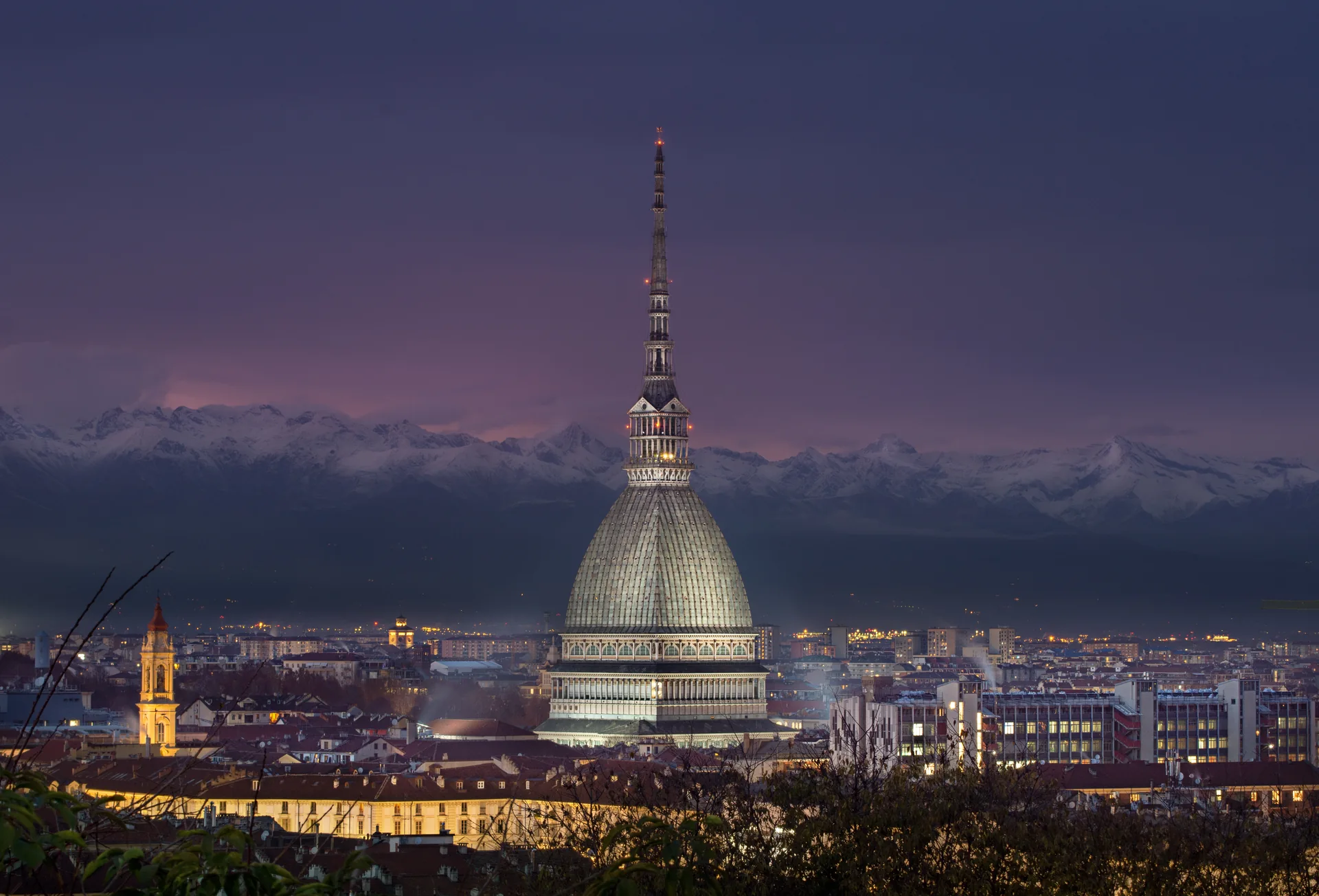 The Mole Antonelliana above Turin at dusk