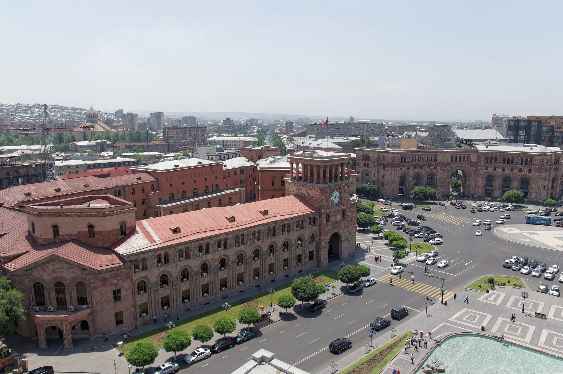 Yerevan’s Government House clock tower and pink stone arcades overlooking Republic Square