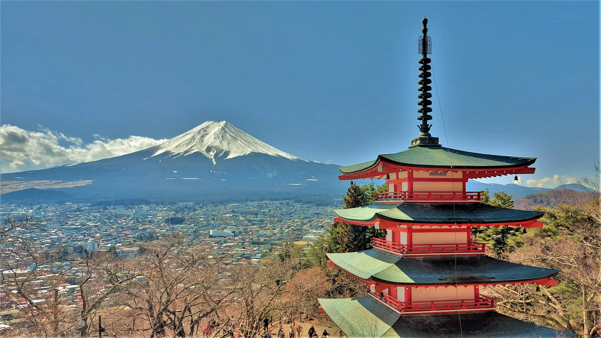 Snow-covered Mount Fuji and the red Chureito Pagoda above Fujiyoshida, Japan