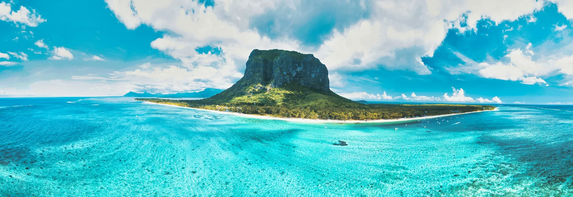 Le Morne Brabant mountain rising above the turquoise lagoon on the southwest coast of Mauritius