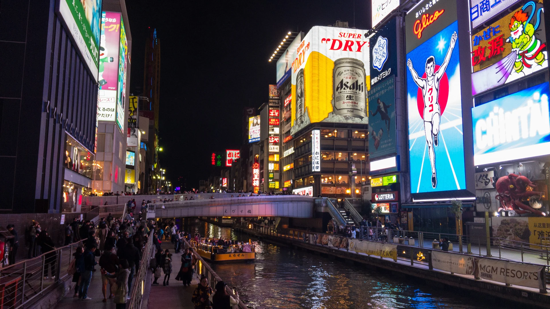 Dōtonbori canal and illuminated signs in central Osaka.