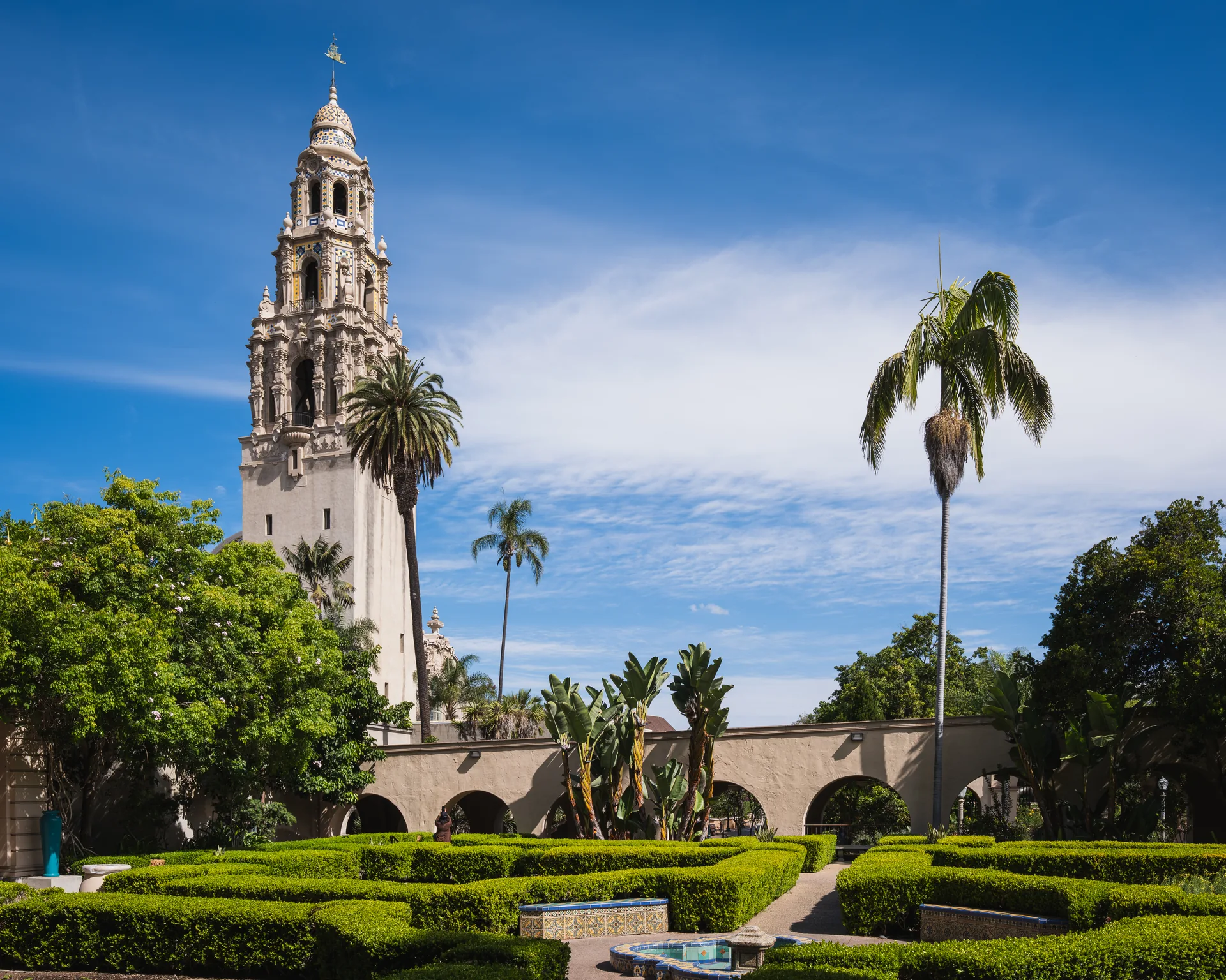 California Tower rising above Alcazar Garden in Balboa Park, San Diego.