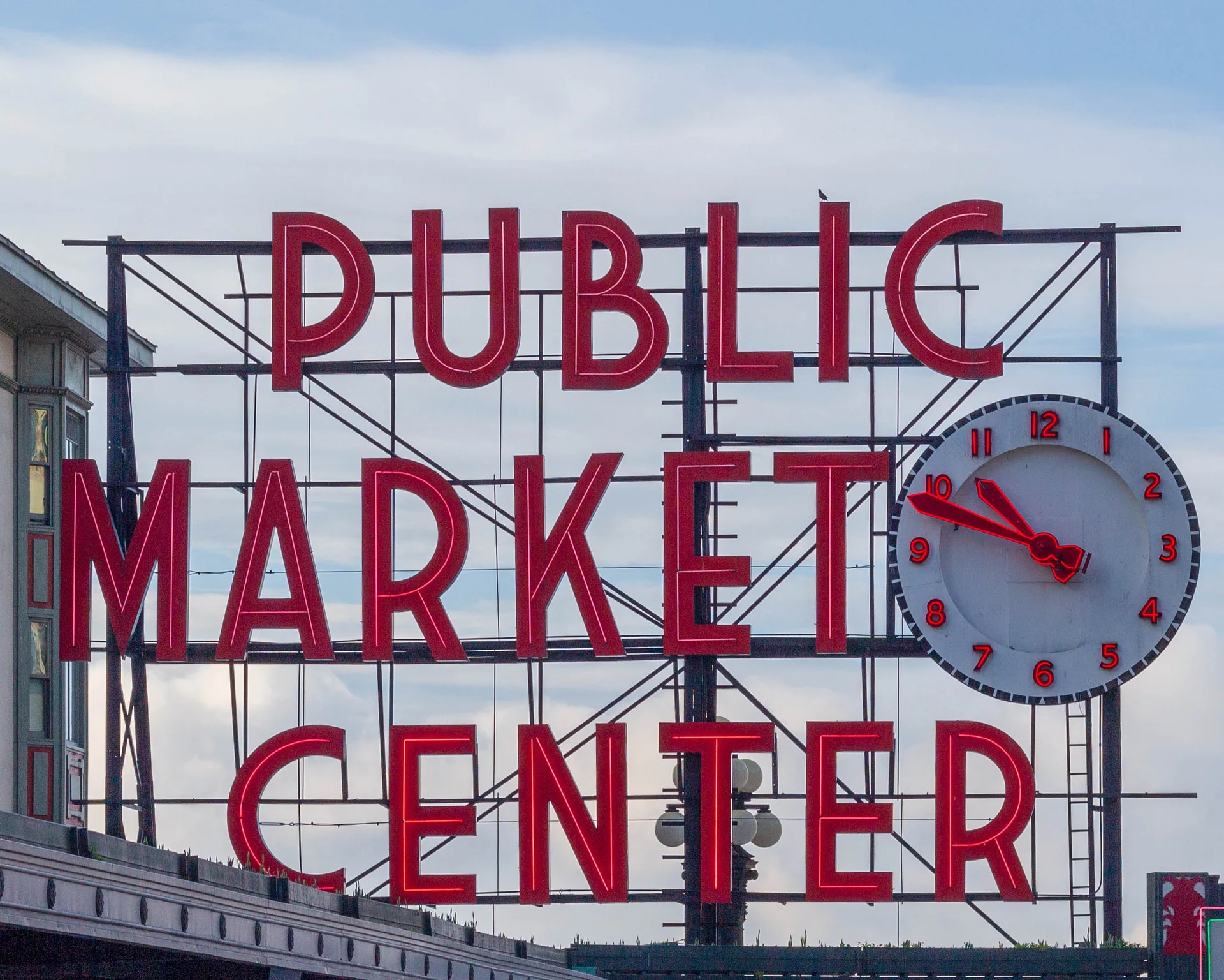 The Public Market Center neon sign and clock at Pike Place Market in Seattle.